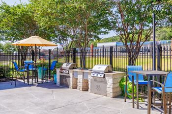 Two gas grills located in clear creek meadows pool area